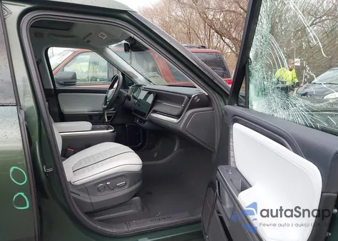 2023 Rivian R1T Adventure Quad Motor Large Pack from USA, damaged, VIN 7FCTGAAA0PN024036